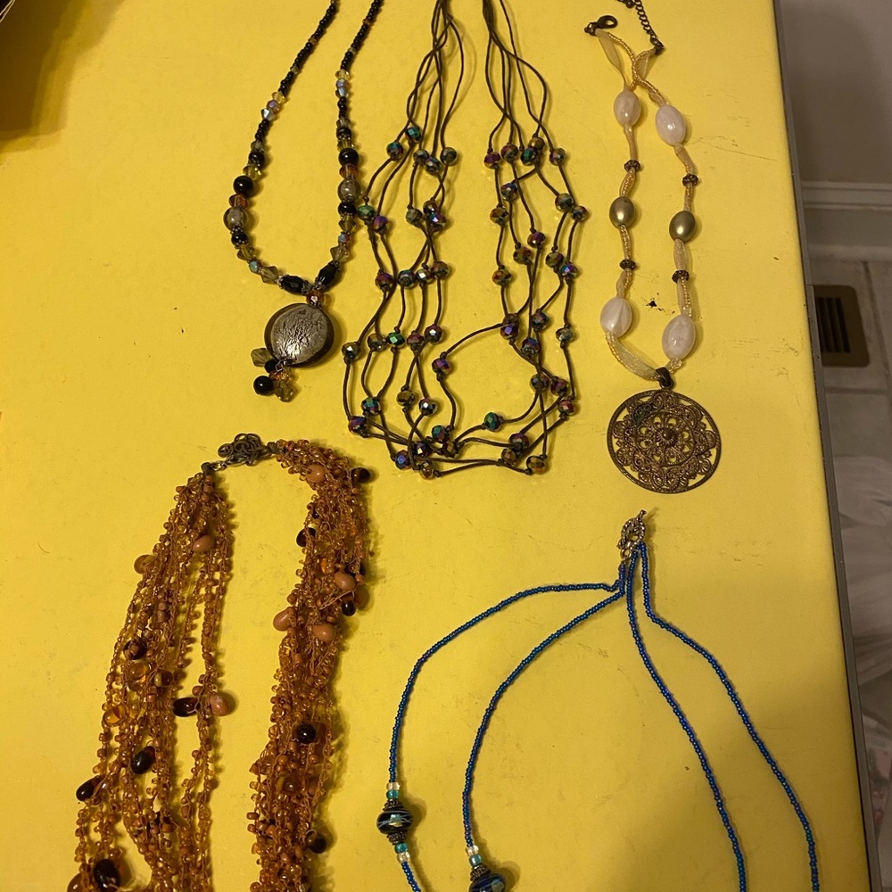 Five beaded necklaces. Sold as group